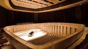 Wide angle of the concert hall at Royal Welsh College of Music and Drama.