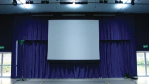 A projection screen installed by J&C Joel.